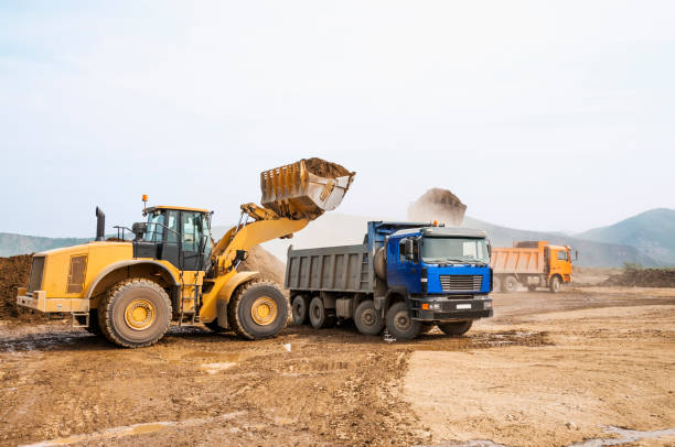 istock Tipper trucks and Loaders in operation (Earthworks ) 657914992