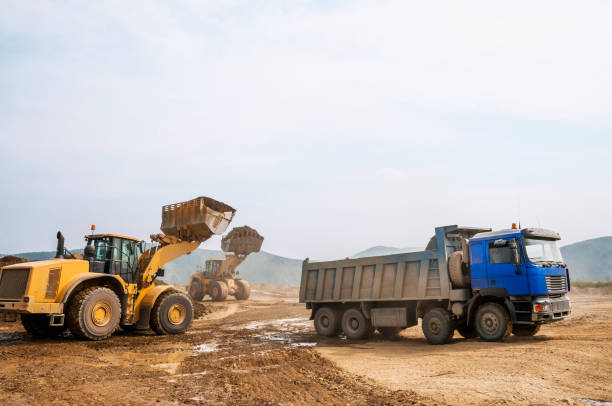 istock Tipper trucks and Loaders in operation (Earthworks ) 657915004