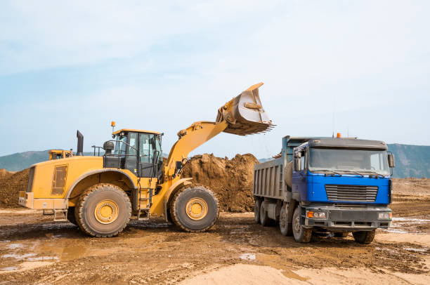 istock Tipper trucks and Loaders in operation (Earthworks ) 657915026
