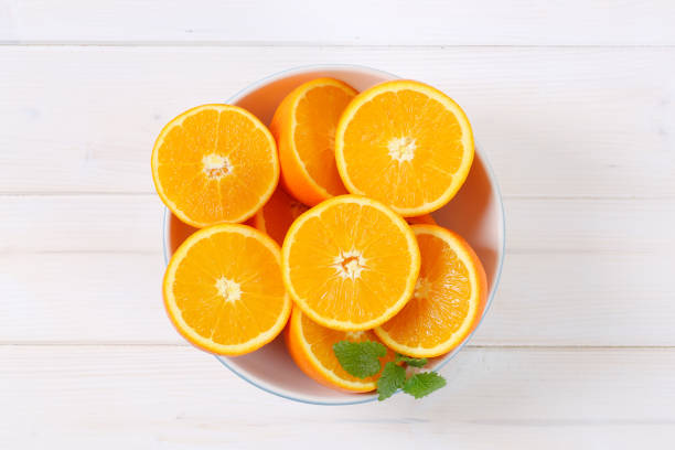 istock pile of halved oranges 657915380