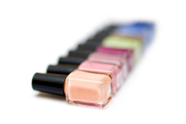 istock Coloured nail polish bottles on a white background 657918134