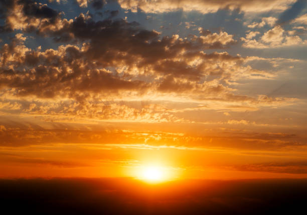 istock Beautiful blue cloudy sky with golden red sunset 657918234