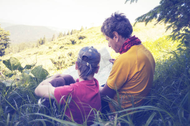 istock Father and son - together on a journey 657918758