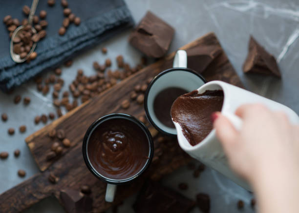 istock Hot chocolate pouring from milk jug 657918870