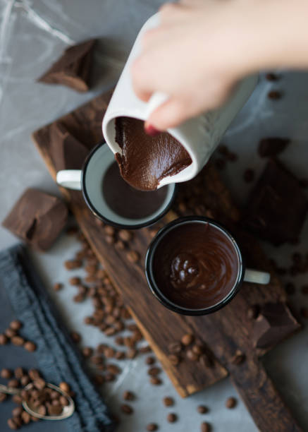 istock Hot chocolate pouring from milk jug 657918888