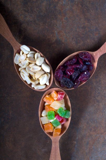 istock Peanuts, raisins and candied fruits - healthy breakfast 657929230