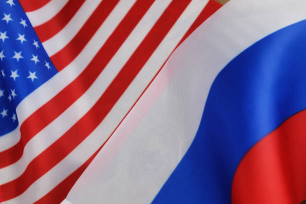 istock russian and usa flag sanctions 657929442