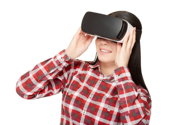 istock Girl in headset of VR watching video 657952092