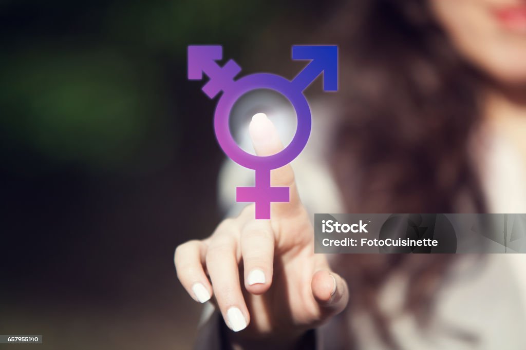 Transgender. Person pressing transgender symbol on touch screen. LGBT right concept. Transgender person coming forward about sexuality orientation. Transgender Person Stock Photo