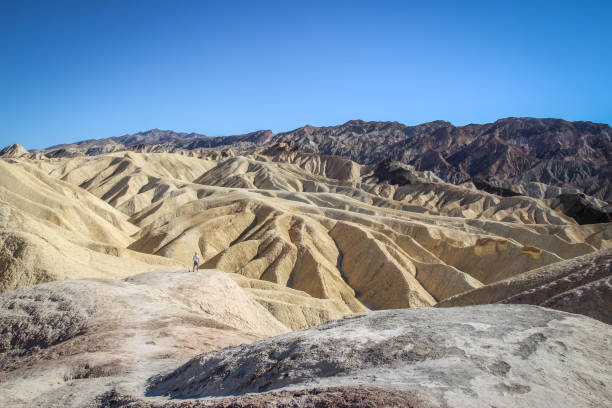 istock A lone tourist at the zabriskie point 657965428