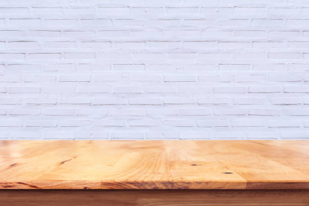 istock Empty top of wood table on white wall background. 657968626