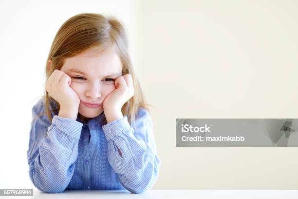 Little Angry Or Bored Girl Portrait Stock Photo - Download Image Now - Child, Boredom, Girls