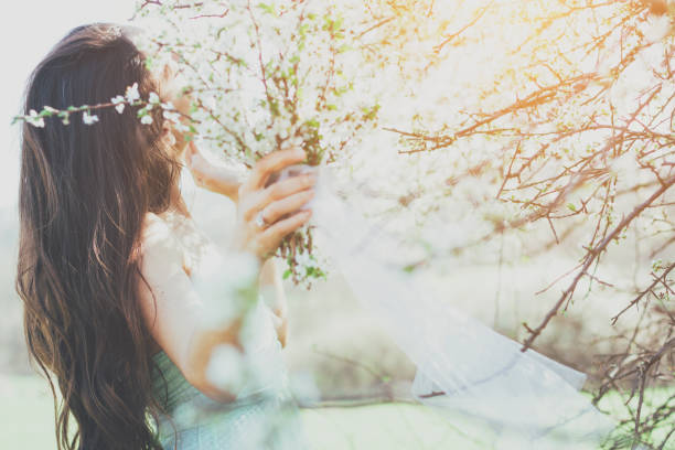 istock bride in the flowered garden in the spring time 657971528