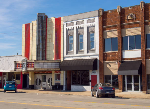 Small town retail business storefronts American small town business storefronts and vintage movie theater theatre building stock pictures, royalty-free photos & images