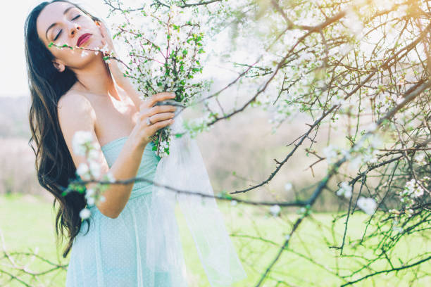 istock bride in the flowered garden in the spring time 657972194