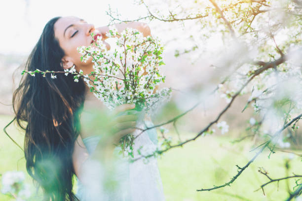 istock bride in the flowered garden in the spring time 657972360
