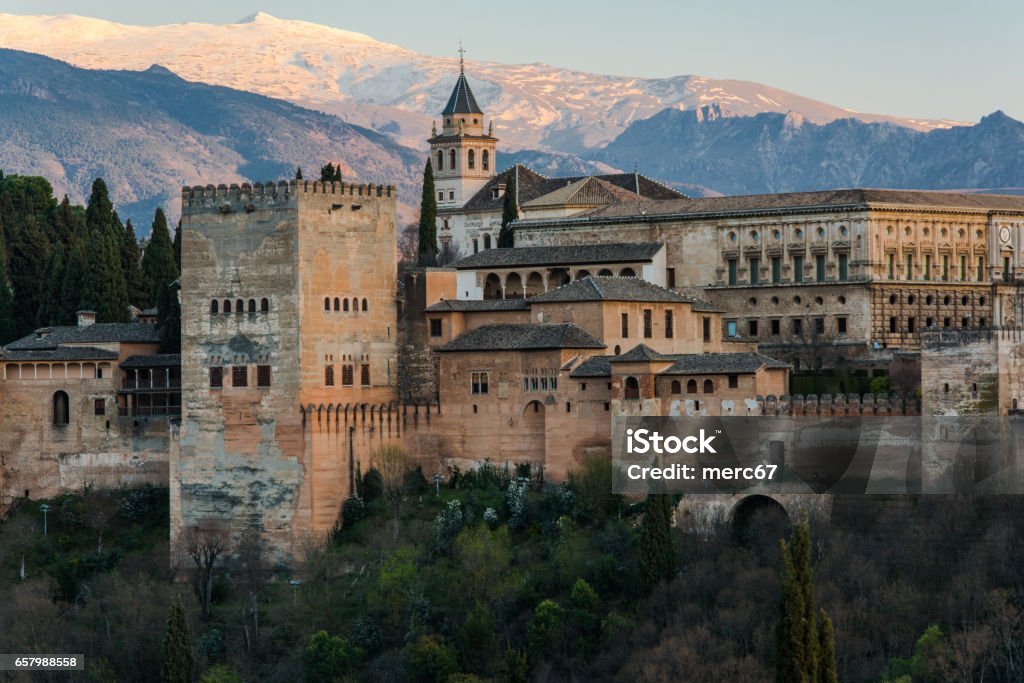 Alhambra palace in Granada,Spain Alhambra palace in Granada,Spain with Sierra NEvada mountains in back. Albaicin Stock Photo