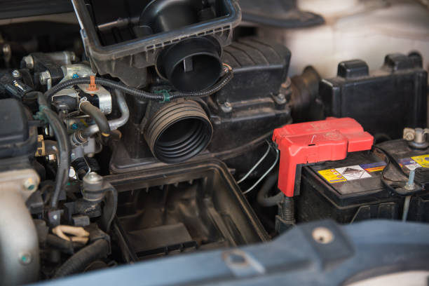 istock Replacing an air filter in a car 657999796