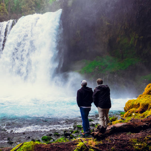 istock Men Exploring Koosah Falls in Oregon 658000094