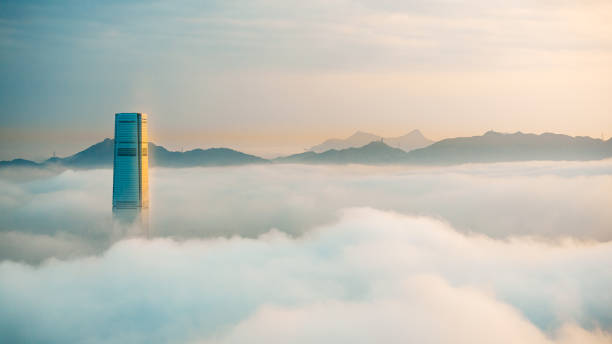 istock Clouds rolling over Hong Kong Victoria Harbor at misty season 658005744