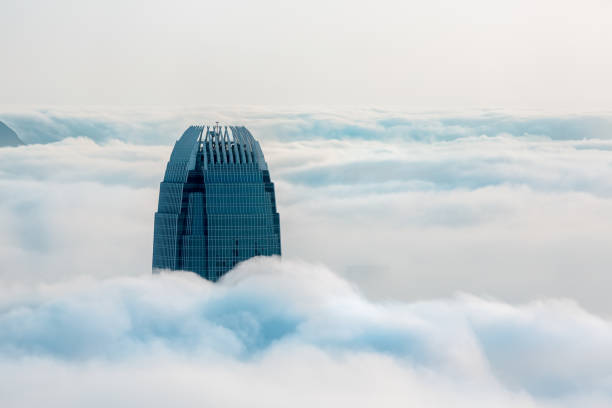 istock Clouds rolling over Hong Kong Victoria Harbor at misty season 658023504