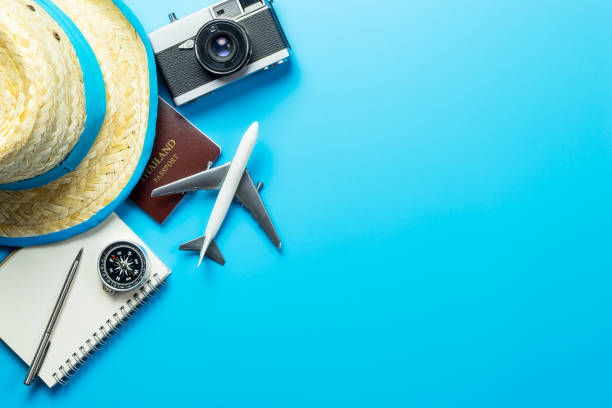 istock Summer travel blogger accesories on blue copy space 658024552