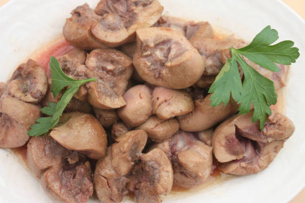 Veal kidney with mushrooms from Paris Veal kidney with mushrooms from Paris - Madeira sauce - Meal served madeira sauce stock pictures, royalty-free photos & images