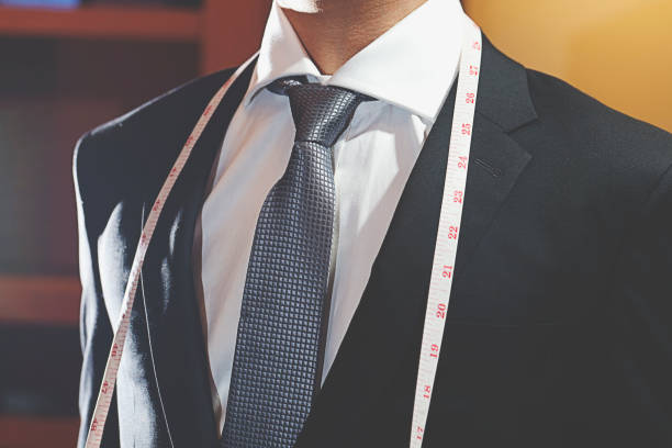 istock Tailor measuring of businessman jacket 658038776