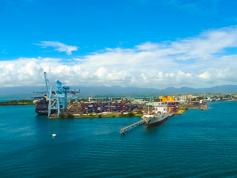 Pointe-a-Pitre, Guadeloupe - February 09, 2013: Cargo ship docked in the port of Pointe-a-Pitre in Guadeloupe