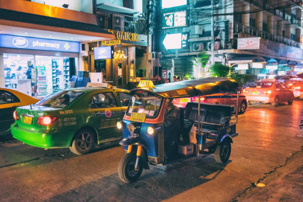tuk tuk and taxi in bangkok - jinrikisha thailand tuk transportation imagens e fotografias de stock