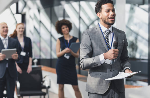 istock Group of Business People on a Conference Event Asking Questions 658051862
