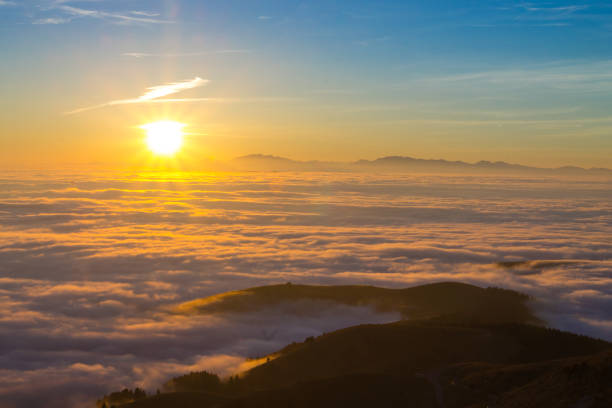 istock Carpet of clouds from mountain top 658057652