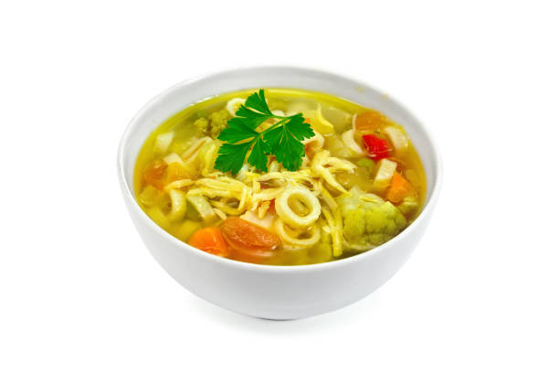 istock Soup Minestrone in white bowl with parsley 658065036