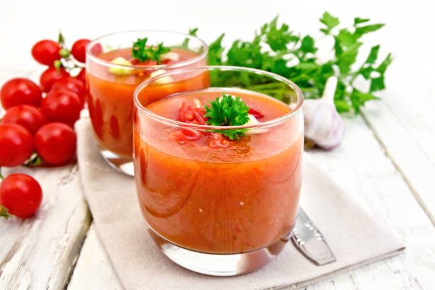 istock Soup tomato in two glasses on board 658065502