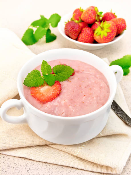 istock Soup strawberry in white bowl on napkin 658065864
