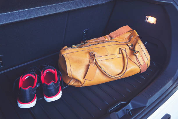 istock bag and shoe in car trunk 658068662