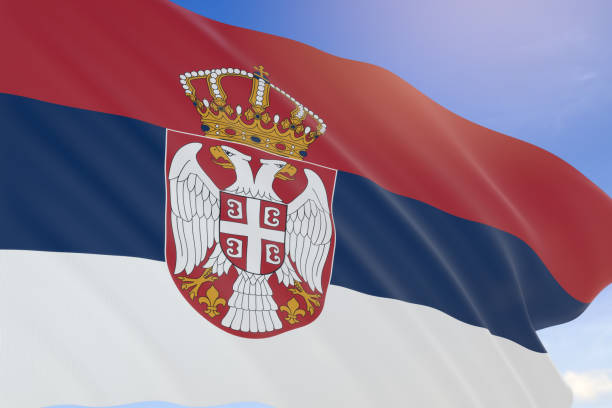 istock 3D rendering of Serbia flag waving on blue sky background 658072556
