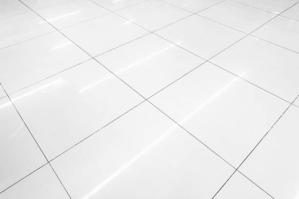 istock Flooring tile background and reflection of luminaire. 658072614
