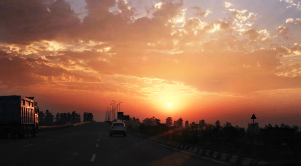 istock Traffic on highway in dusky day 658078910