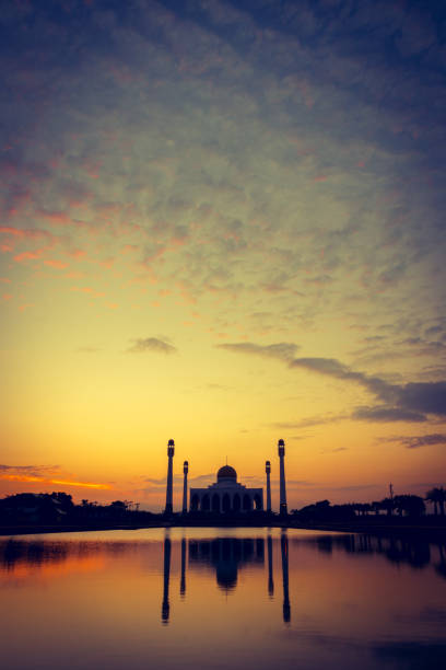 istock Silhouette of mosque at sunset 658081906