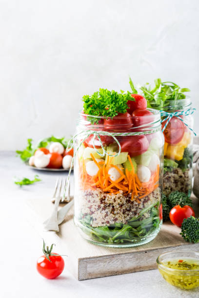 istock Salad in glass jar with quinoa 658089418