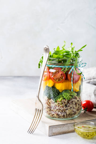 istock Salad in glass jar with quinoa 658089630