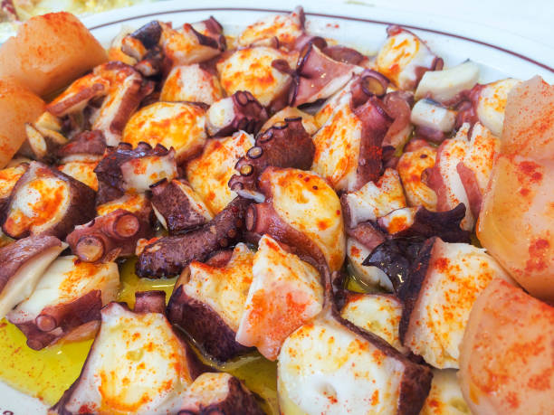 istock Octopus with potatoes on fair sauce 658096240