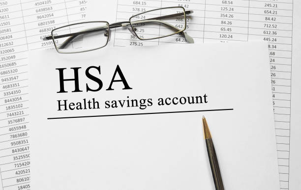 istock Paper with Health Savings Account HSA on a table 658097232