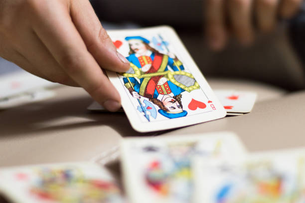 istock The hand holds a playing card 658100880