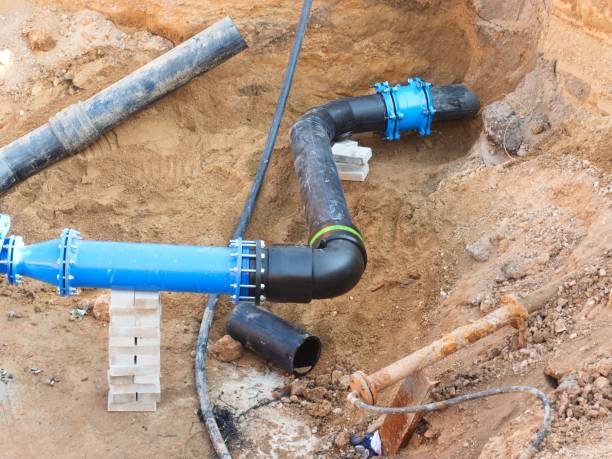 istock Plastic tubes joined with steel pipes with joint member and flange. 658110950