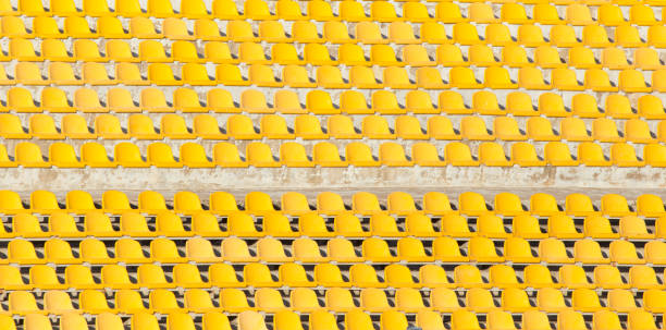 istock yellow seats on the podium 658111954