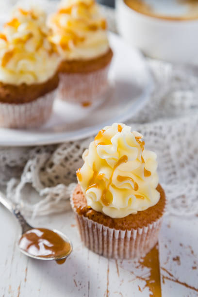 istock Caramel cupcakes with buttercream frosting 658112110