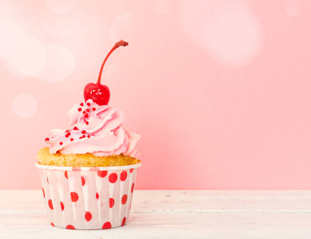 istock Cupcake with pink cream and cherry 658118210