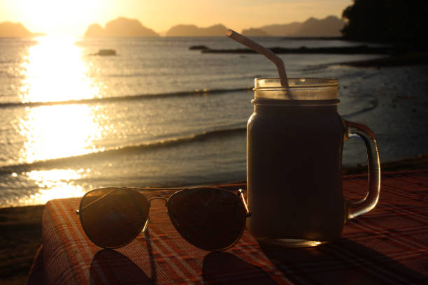istock Men whith amazing sunset over the sea. Philippines 658121900